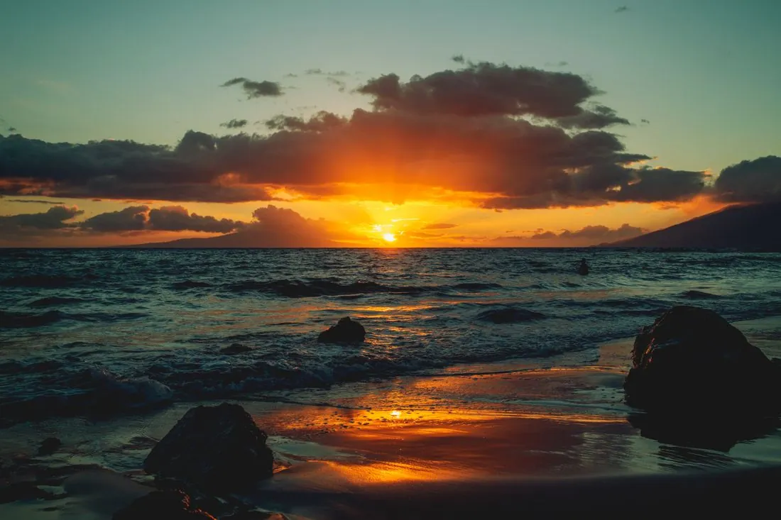 South Maui coastline glowing at sunset
